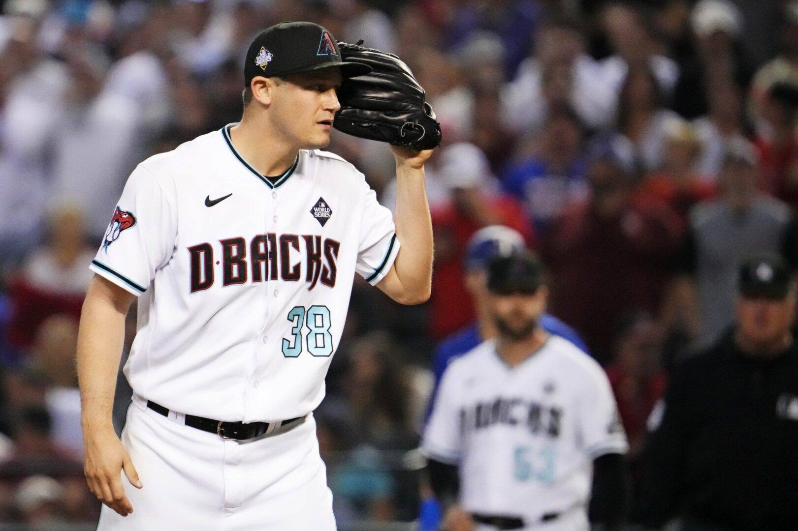 Arizona Diamondbacks closer Paul Sewald (38) faces the Texas Rangers in the ninth inning of Game 5 of the 2023 World Series at Chase Field.
