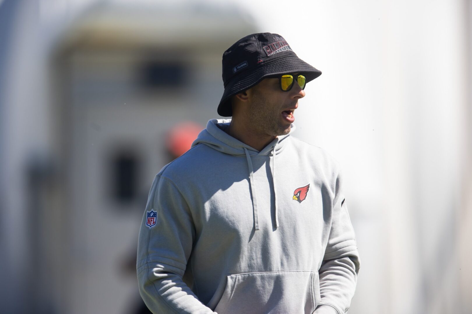 Cardinals head coach observes rookie minicamp.