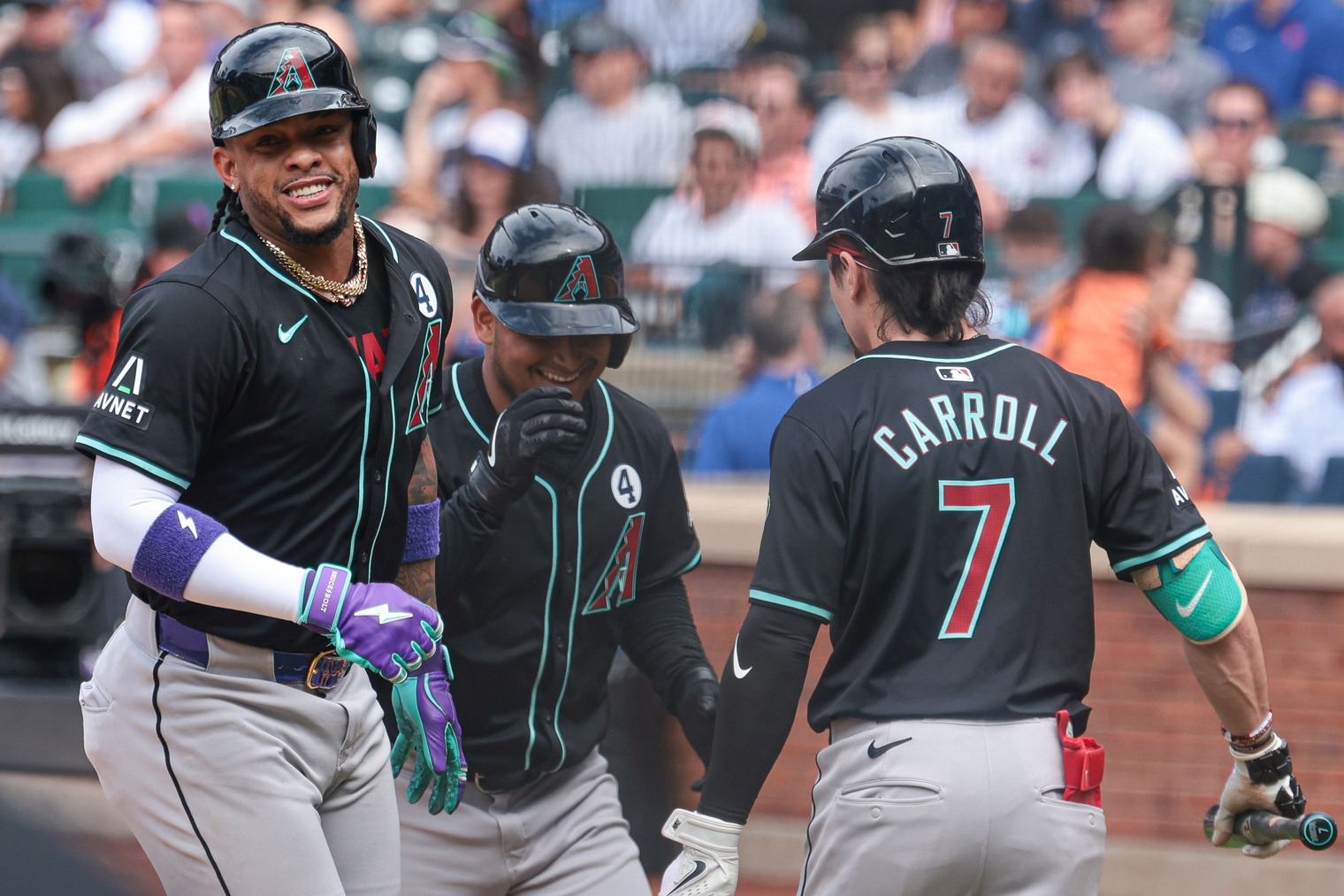 Ketel Marte celebrates with Gabriel Moreno and Corbin Carroll after hitting a go-ahead two-run home run against the Mets.