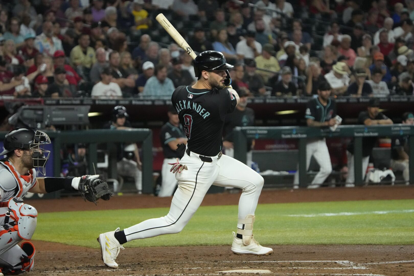 Diamondbacks infielder Blaze Alexander bats against the San Francisco Giants at Chase Field.