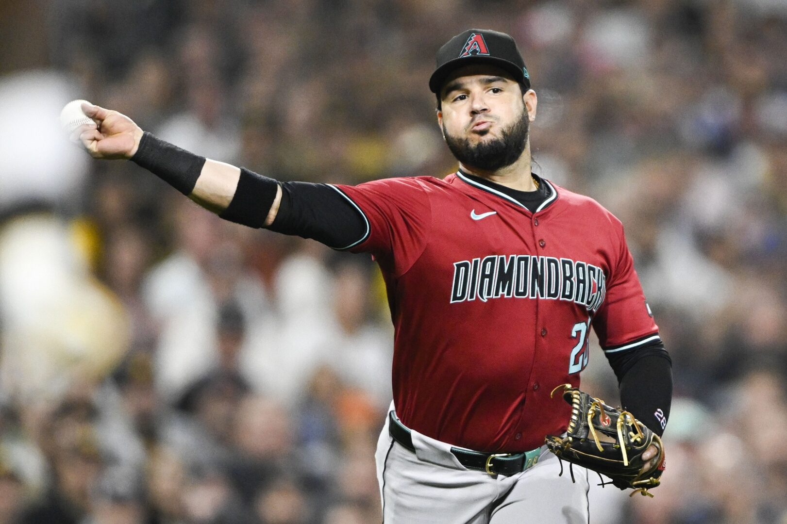Arizona Diamondbacks third baseman Eugenio Suarez throws the ball across the diamond.