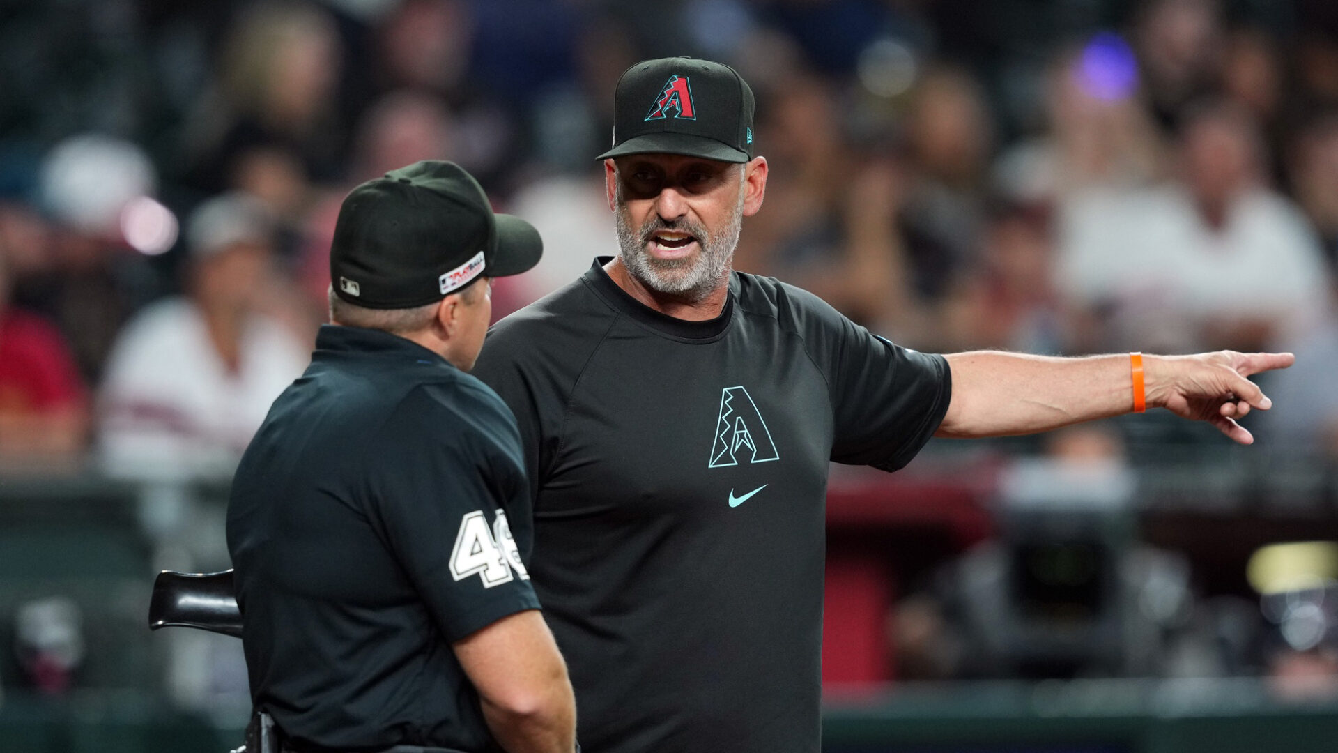 Diamondbacks manager Torey Lovullo argues with home plate umpire Nick Mahrley after getting ejected.