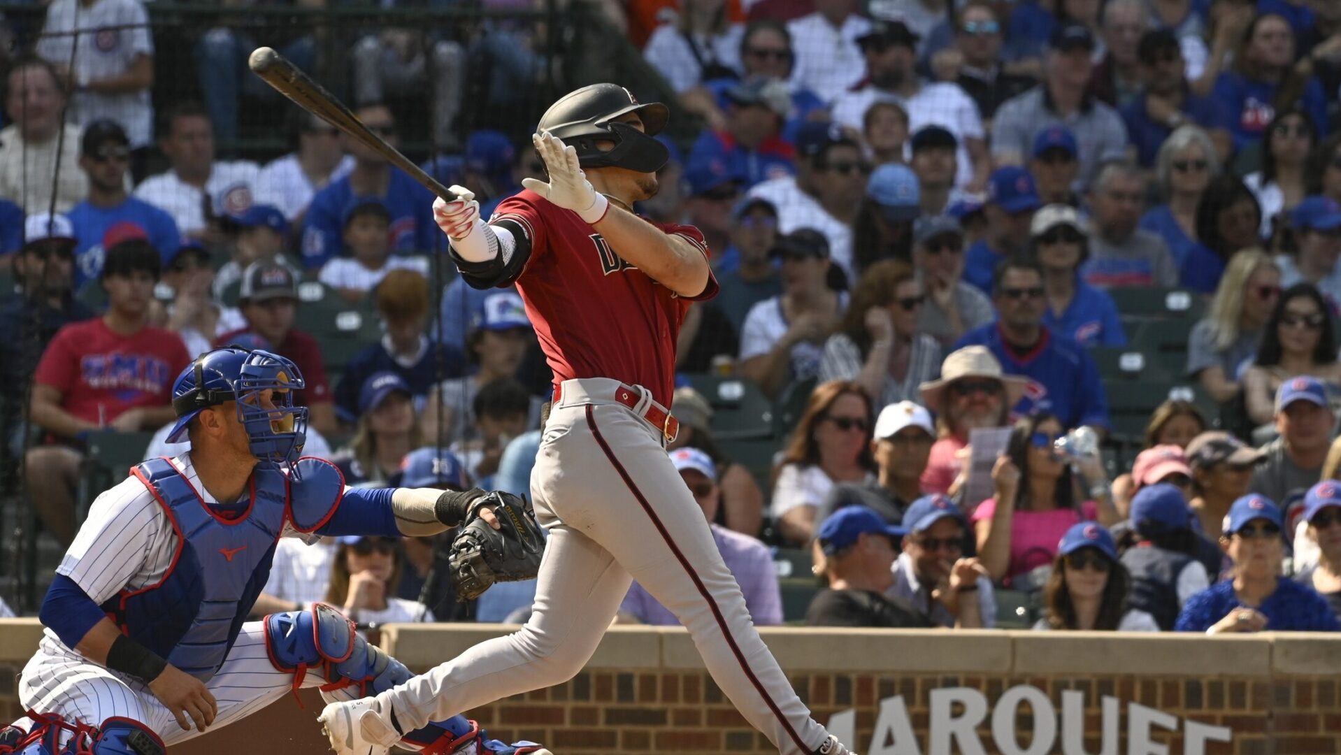 Diamondbacks center fielder Alek Thomas bats against the Chicago Cubs at Wrigley Field.