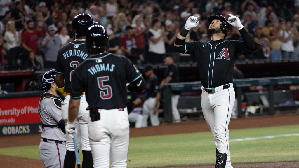 Diamondbacks third baseman Eugenio Suárez celebrates after hitting a two-run home run against the Atlanta Braves at Chase Field.