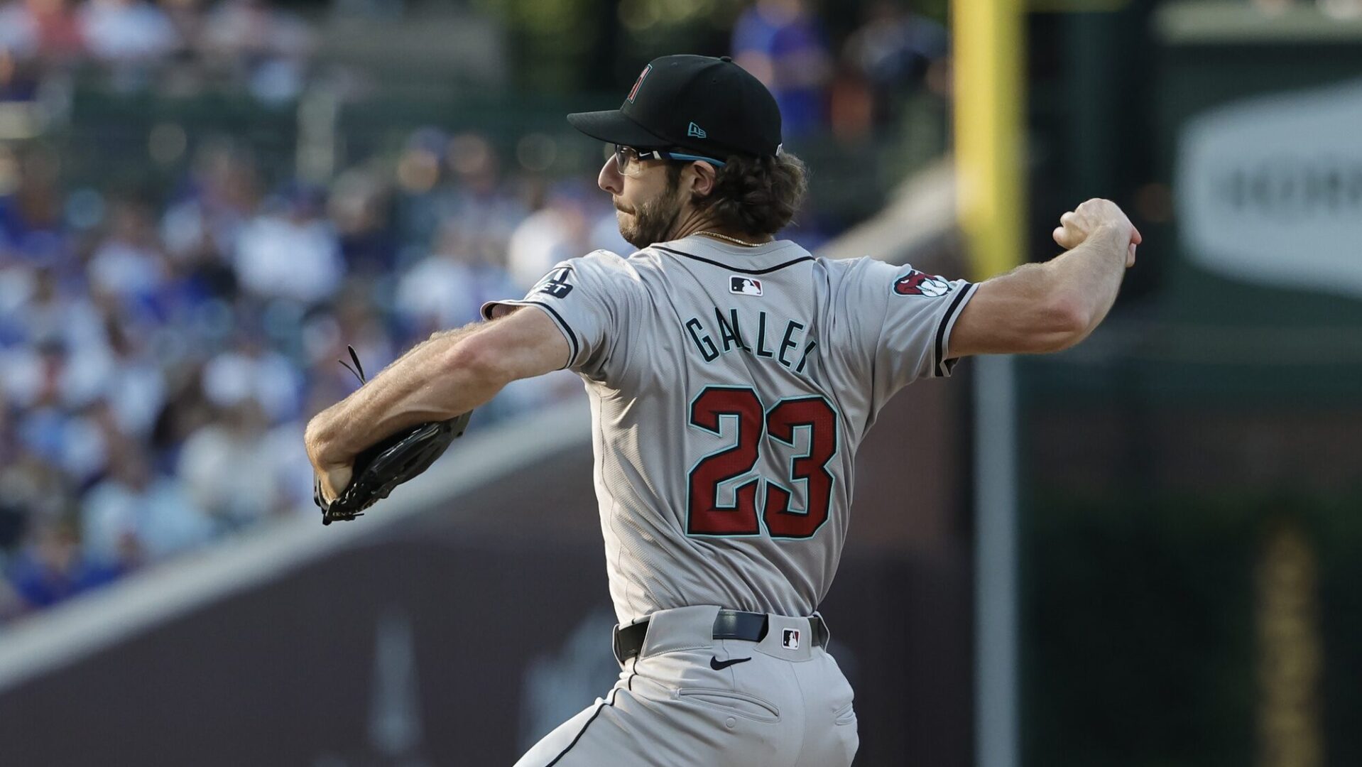 Diamondbacks starting pitcher Zac Gallen pitches against the Chicago Cubs at Wrigley Field.