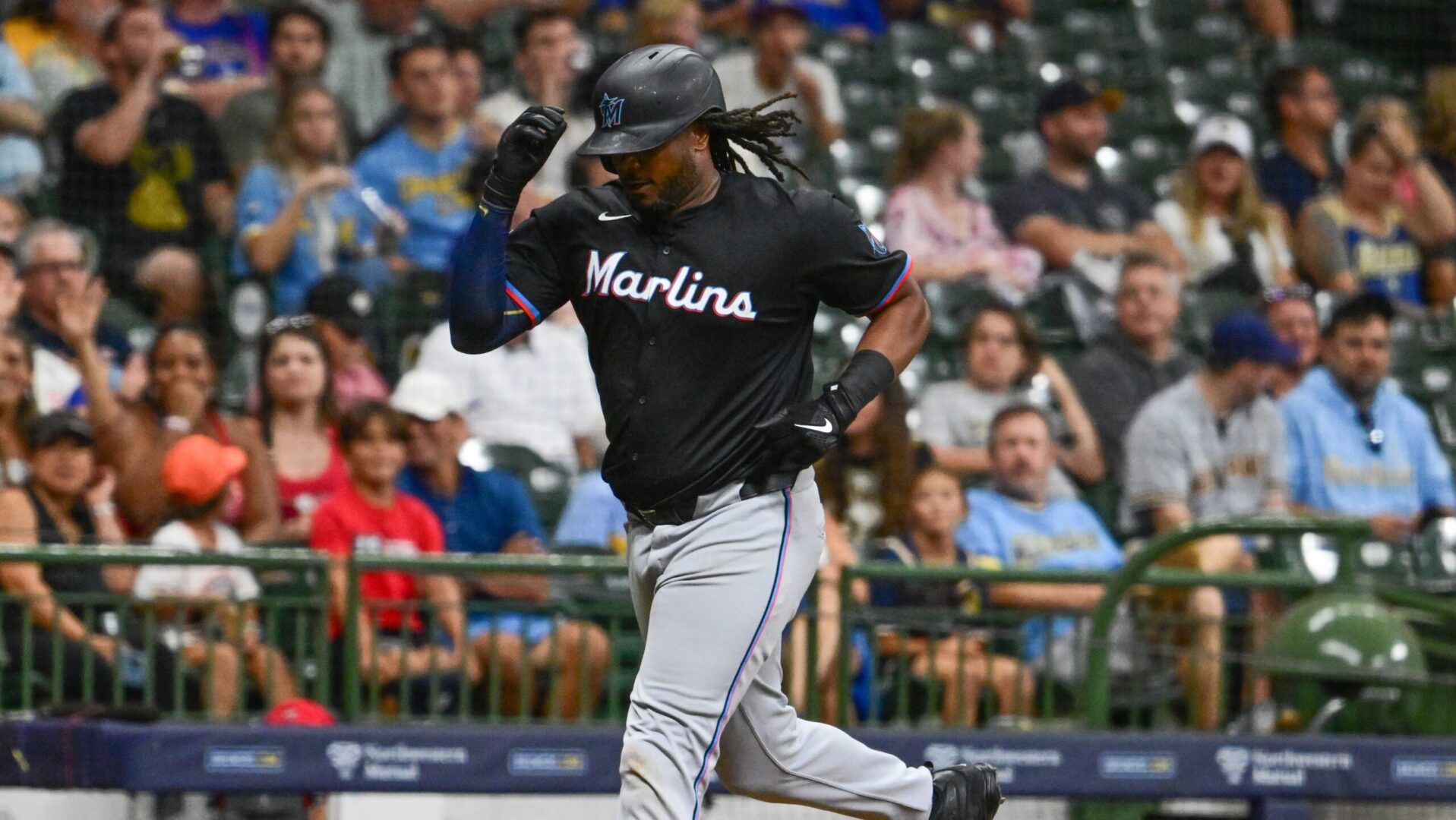 Miami Marlins first baseman Josh Bell rounds the bases after hitting a home run against the Milwaukee Brewers at American Family Field.