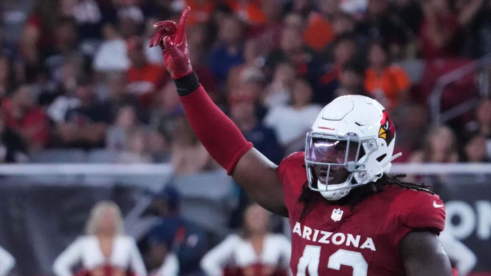 Arizona Cardinals outside linebacker Jesse Luketa celebrates a sack of Russell Wilson.