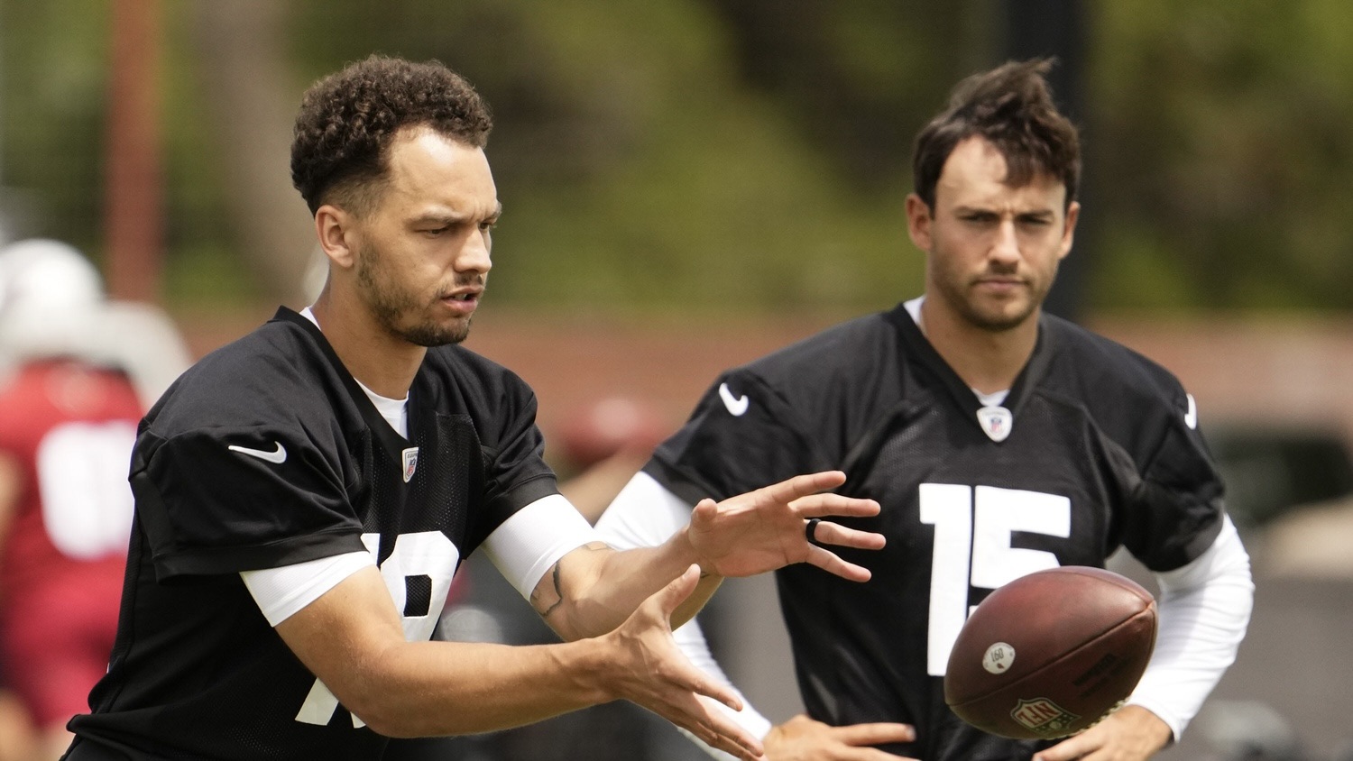 Arizona Cardinals quarterbacks Desmond Ridder and Clayton Tune during OTAs.