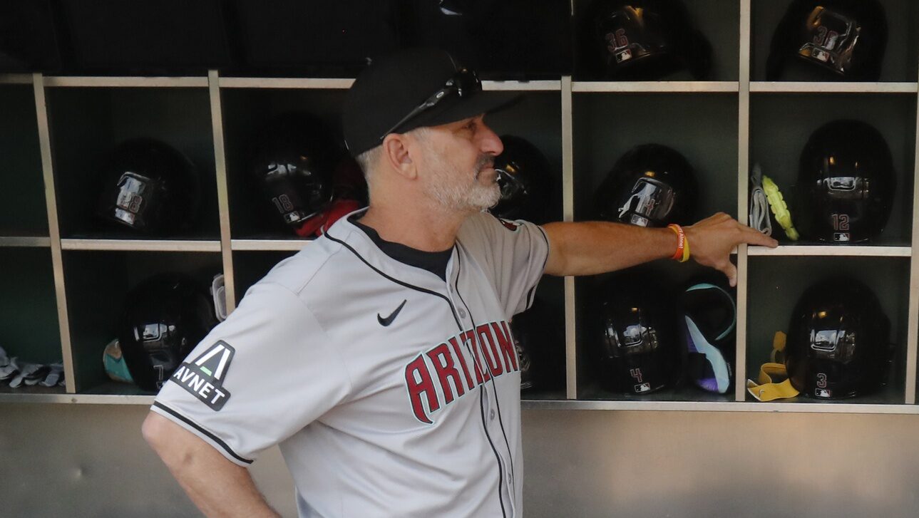 Diamondbacks manager Torey Lovullo near the bat rack watching his team play the Pittsburgh Pirates at PNC Park.