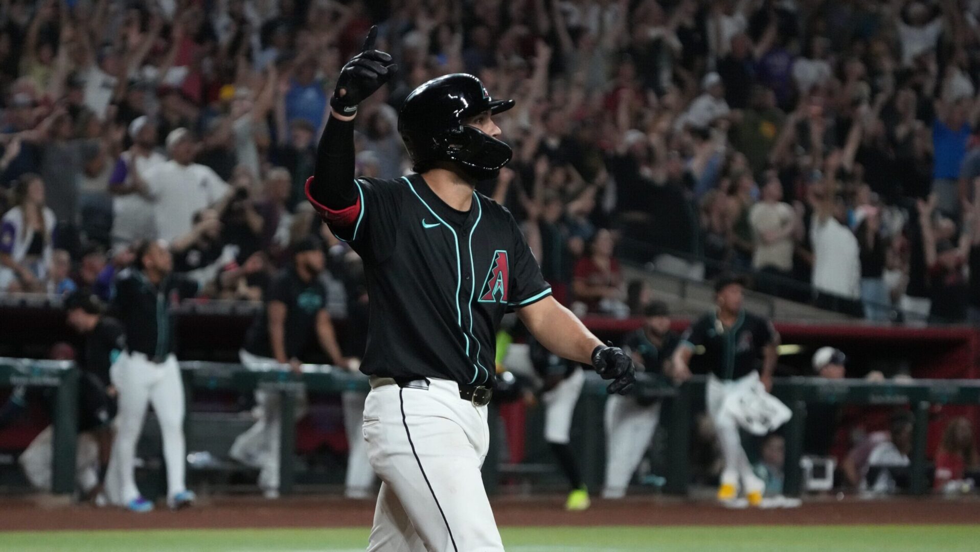 Arizona Diamondbacks catcher Adrian Del Castillo celebrates a walk-off home run to beat the Philadelphia Phillies at Chase Field.