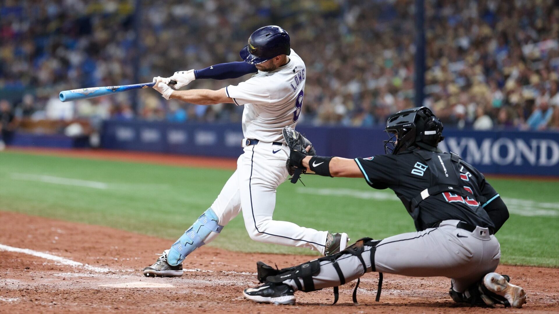 Rays designated hitter Brandon Lowe singles in a play where the winning run came around to score.