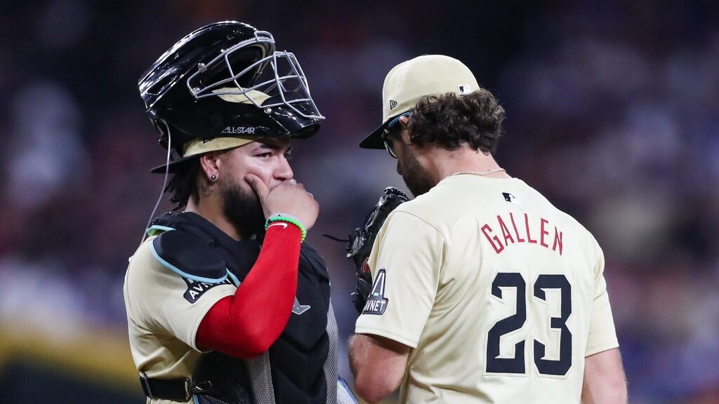Diamondbacks starting pitcher Zac Gallen and catcher Jose Herrera talk on the mound.