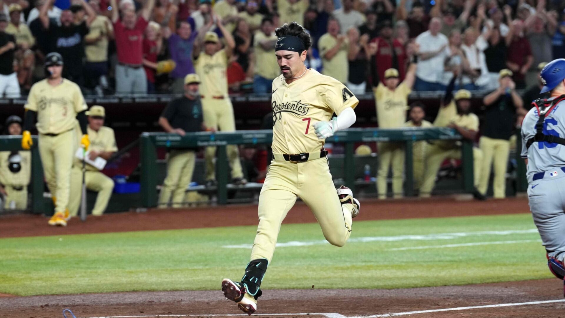 Corbin Carroll scores after running out an inside the park home run.