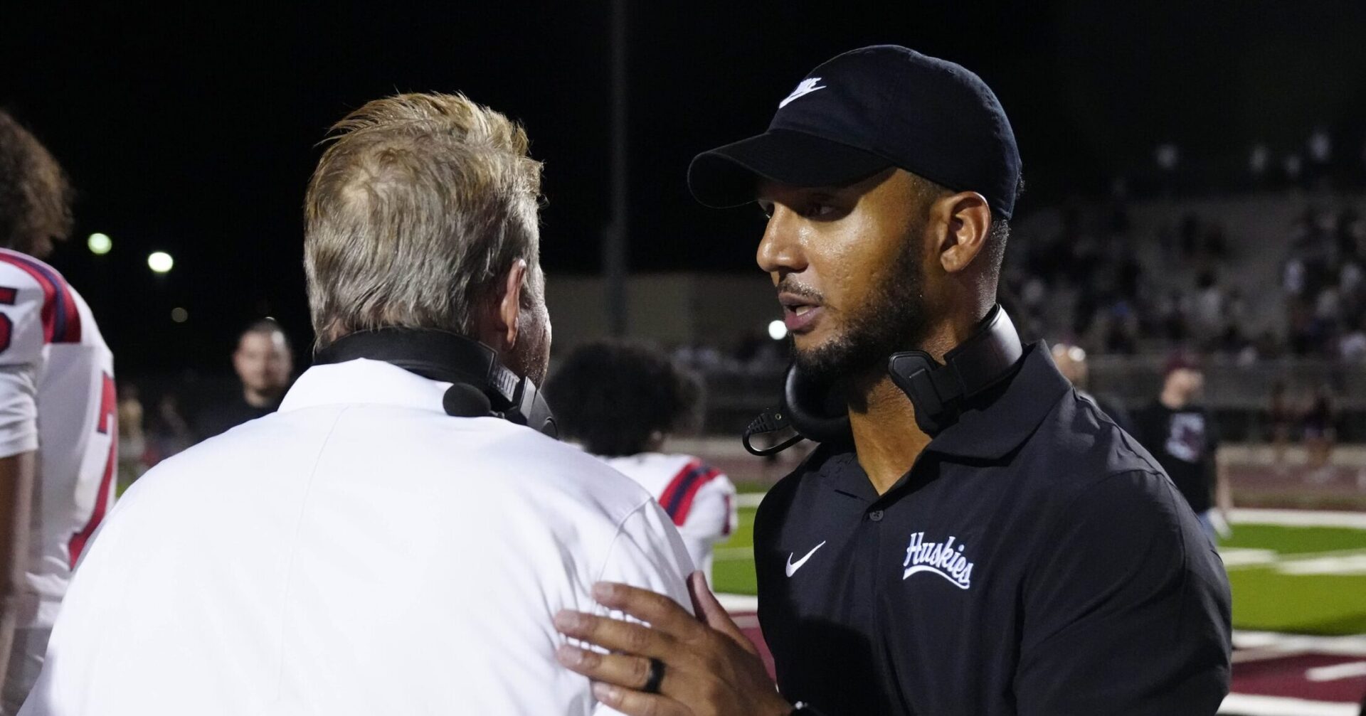 Hamilton head coach Travis Dixon shakes hands with Centennial coach Richard Taylor after Hamliton won 17-10.