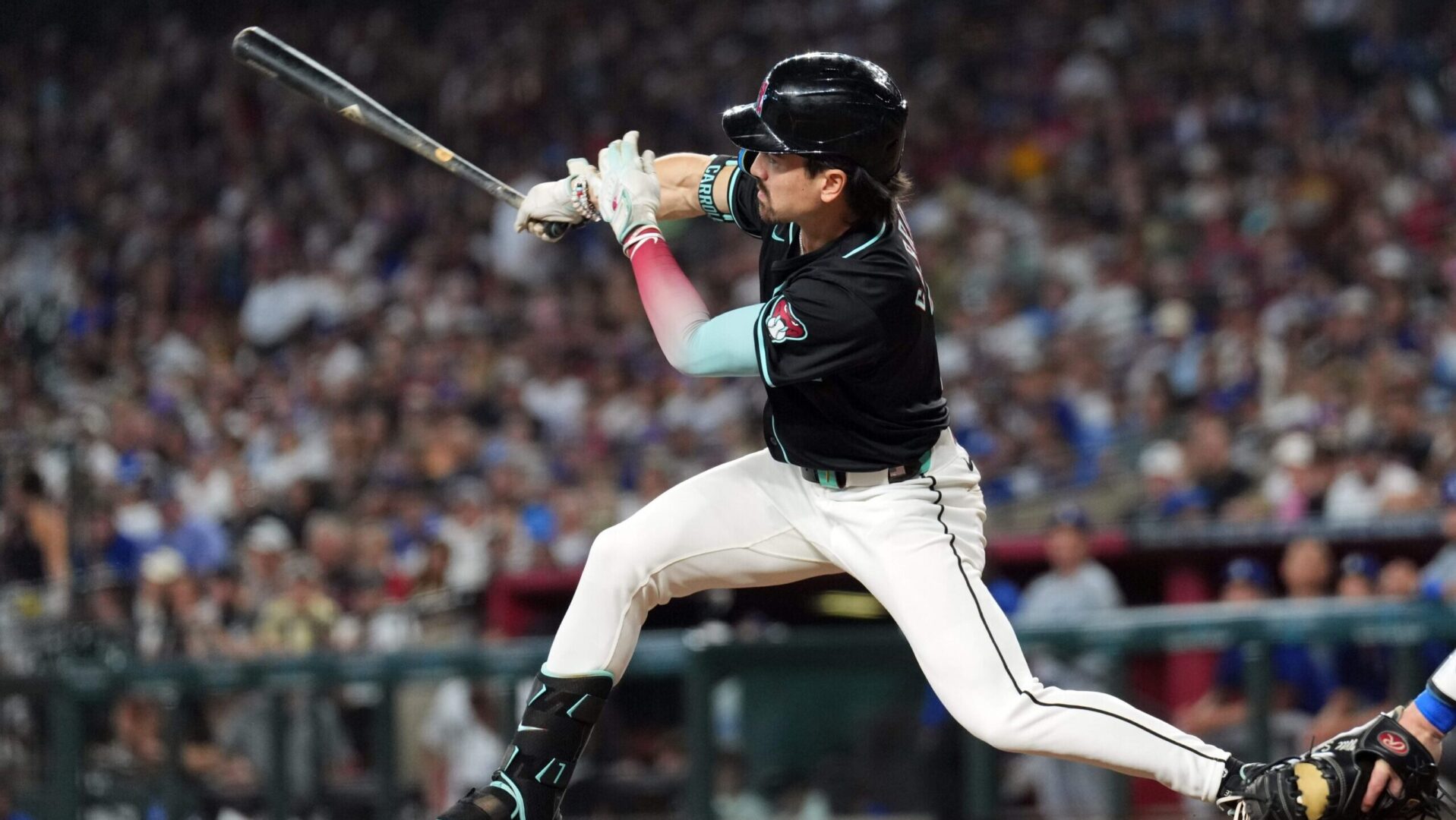 Diamondbacks right fielder Corbin Carroll bats against the Los Angeles Dodgers.