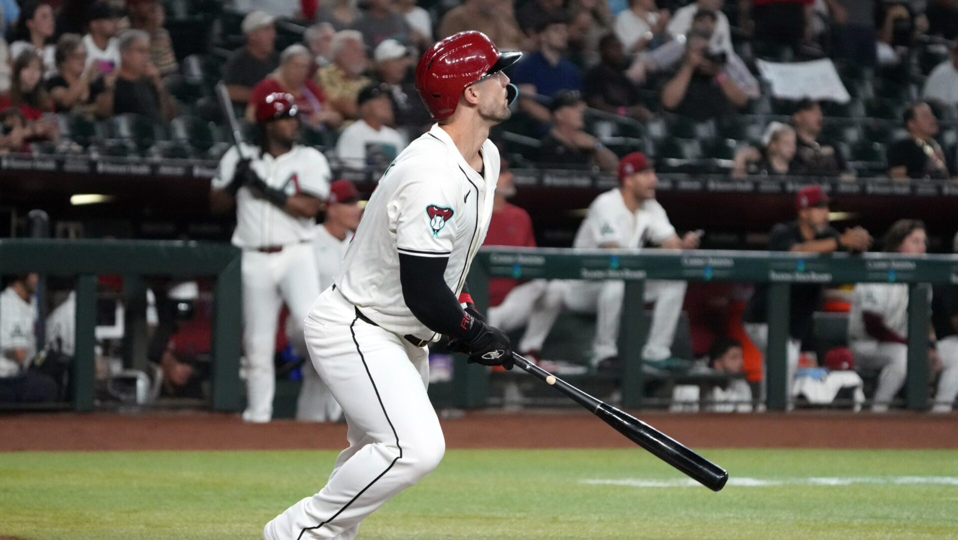 Randal Grichuk hits a two-run home run against the Texas Rangers.