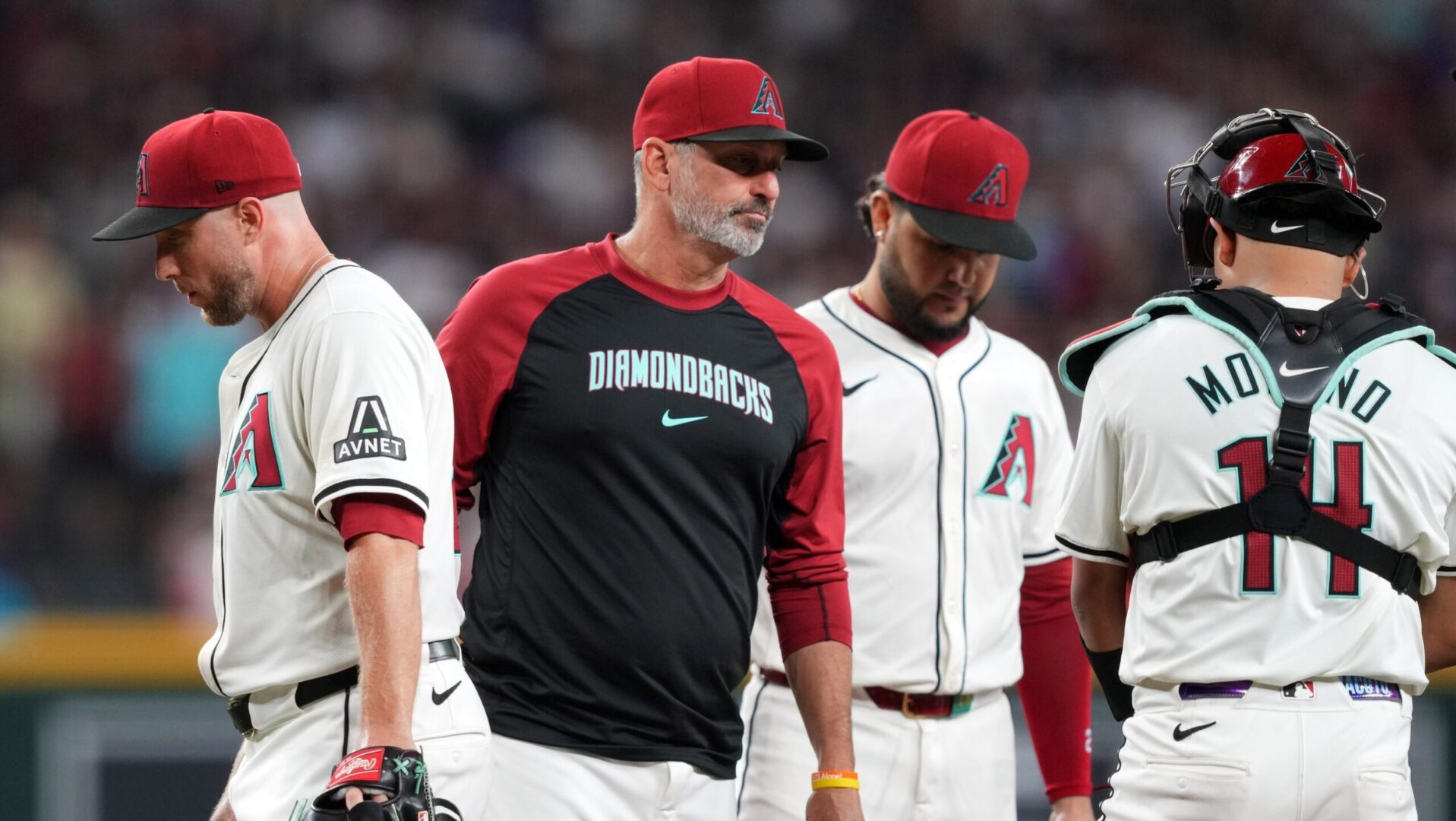 Diamondbacks starting pitcher Merrill Kelly is removed from the game against the San Diego Padres at Chase Field.