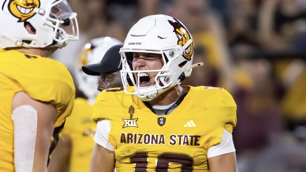 Sep 7, 2024; Tempe, Arizona, USA; Arizona State Sun Devils quarterback Sam Leavitt (10) celebrates a touchdown against the Mississippi State Bulldogs in the first half at Mountain America Stadium. Mandatory Credit: Mark J. Rebilas-Imagn Images