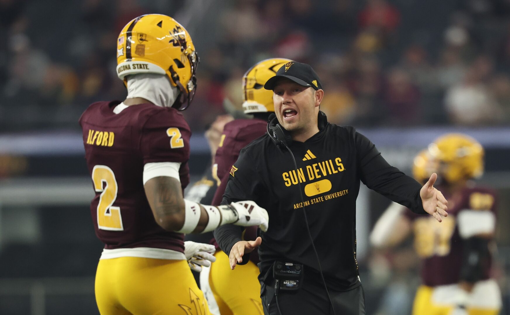 Dec 7, 2024; Arlington, TX, USA; Arizona State Sun Devils head coach Kenny Dillingham speaks with Arizona State Sun Devils defensive back Xavion Alford (2) during the first half against the Iowa State Cyclones at AT&T Stadium. Mandatory Credit: Kevin Jairaj-Imagn Images