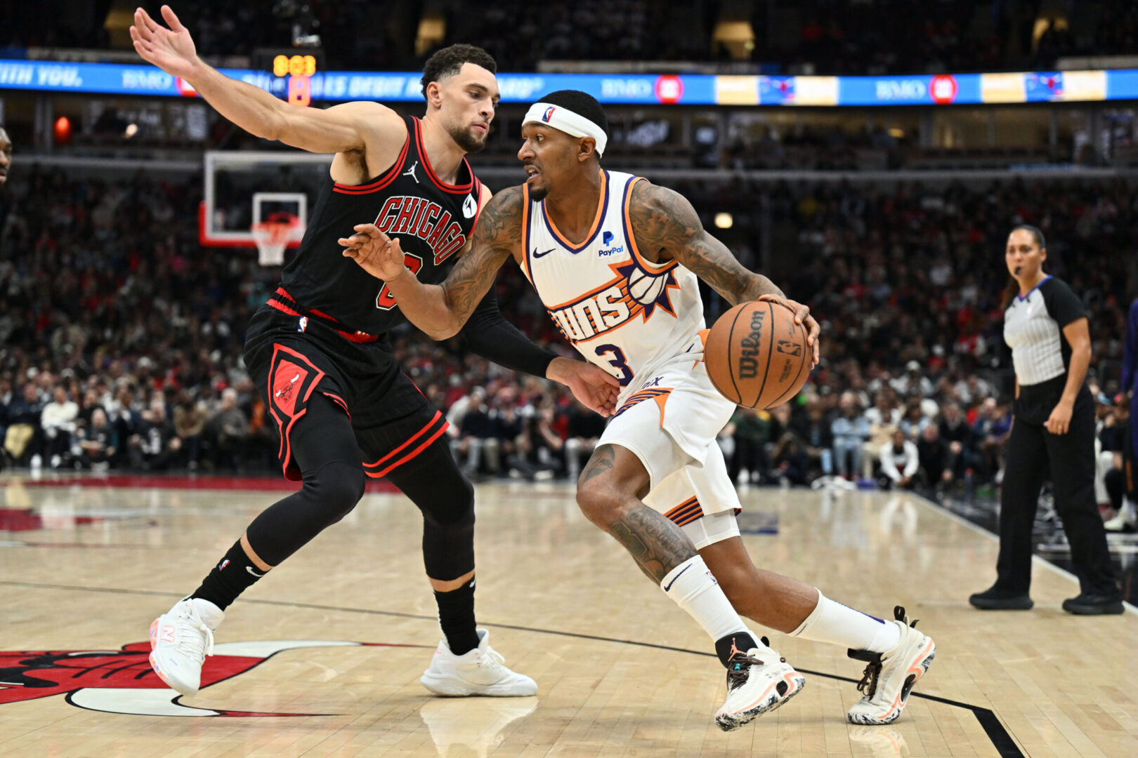 Nov 8, 2023; Chicago, Illinois, USA; Phoenix Suns guard Bradley Beal (3) drives to the basket as Chicago Bulls forward Zach LaVine (8) defends in the second half at United Center. Mandatory Credit: Jamie Sabau-Imagn Images