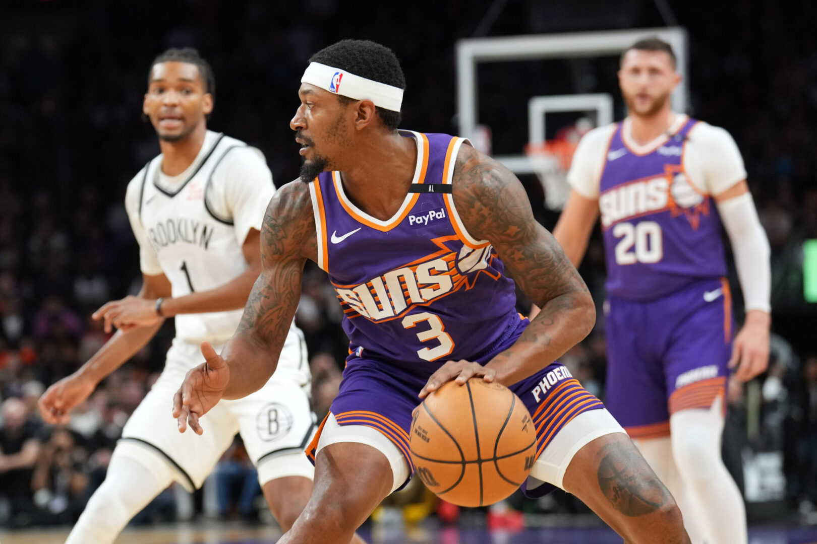 Nov 27, 2024; Phoenix, Arizona, USA; Phoenix Suns guard Bradley Beal (3) dribbles against the Brooklyn Nets during the first half at Footprint Center. Mandatory Credit: Joe Camporeale-Imagn Images