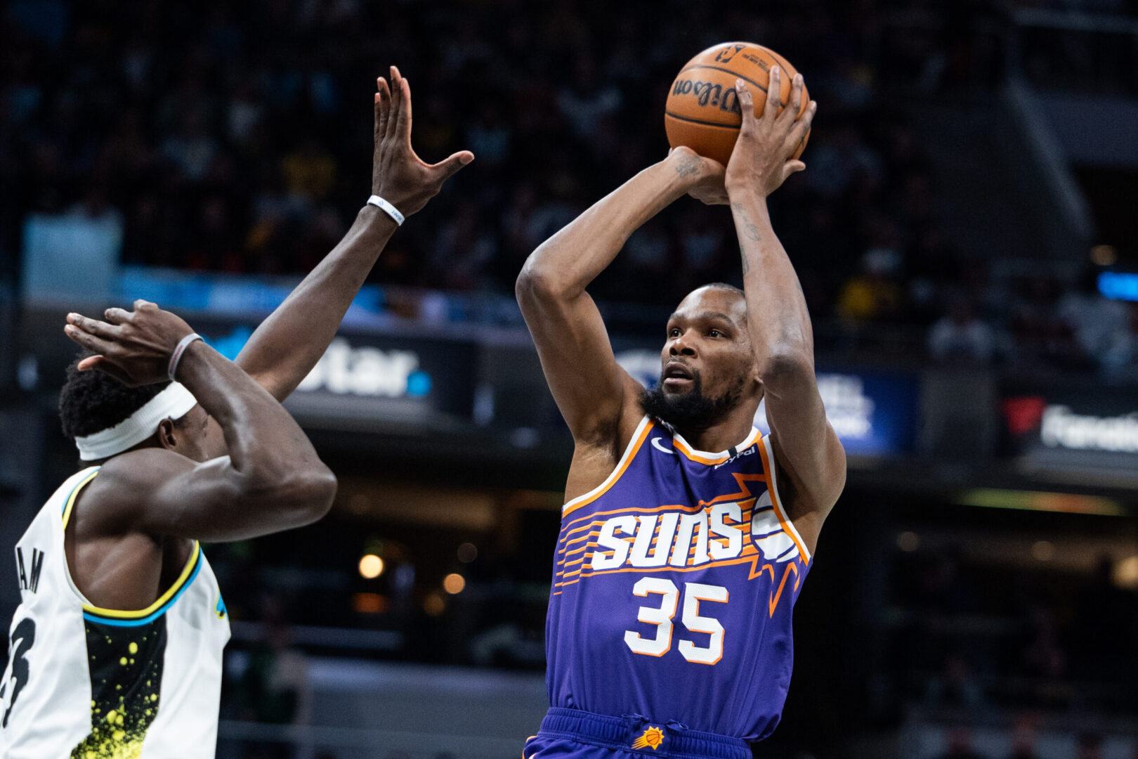 Jan 4, 2025; Indianapolis, Indiana, USA; Phoenix Suns forward Kevin Durant (35) shoots the ball against Indiana Pacers forward Pascal Siakam (43) in the first half at Gainbridge Fieldhouse. Mandatory Credit: Trevor Ruszkowski-Imagn Images