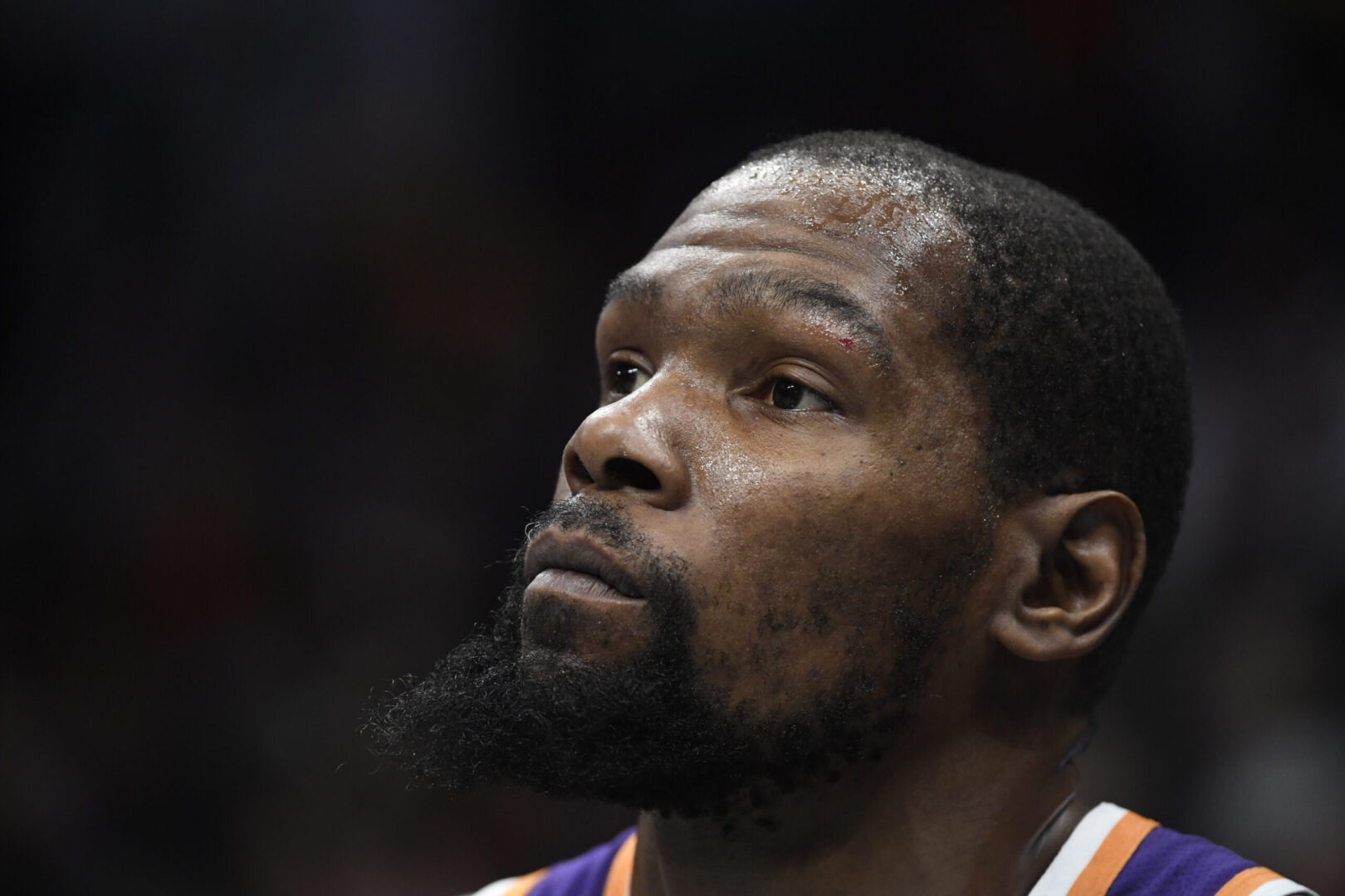 Jan 7, 2025; Charlotte, North Carolina, USA; Phoenix Suns forward Kevin Durant (35) in a time out during the first half against the Charlotte Hornets at the Spectrum Center. Mandatory Credit: Sam Sharpe-Imagn Images