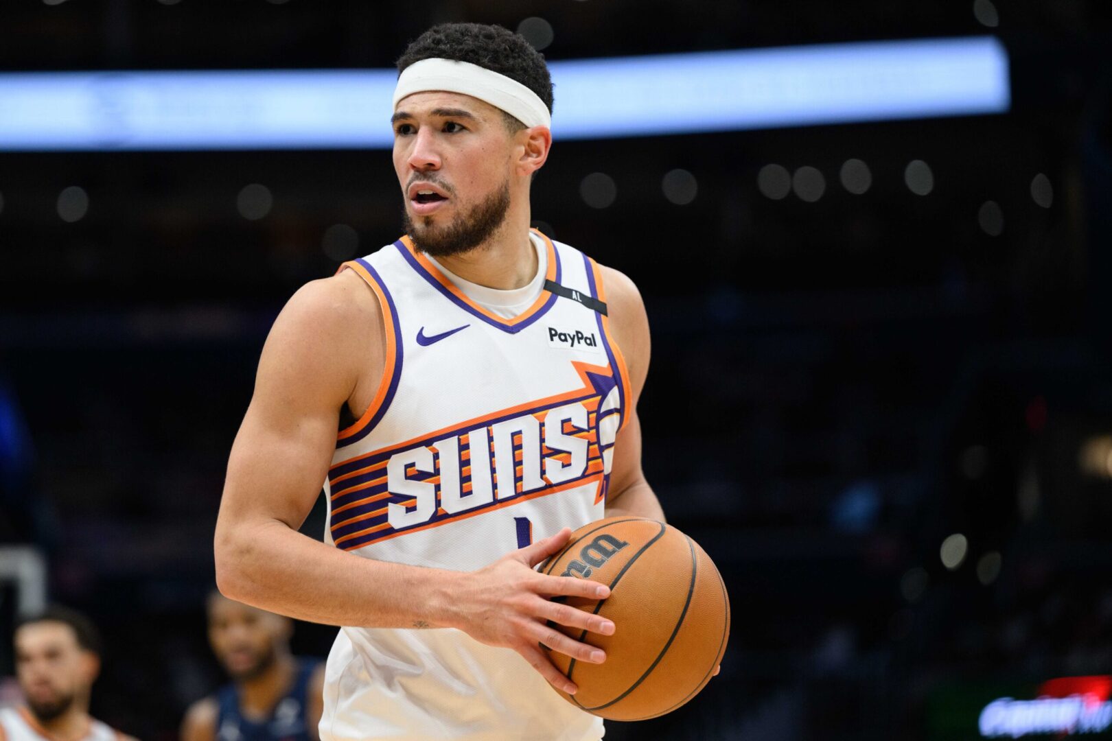Jan 16, 2025; Washington, District of Columbia, USA; Phoenix Suns guard Devin Booker (1) looks on during the third quarter against the Washington Wizards at Capital One Arena. Mandatory Credit: Reggie Hildred-Imagn Images