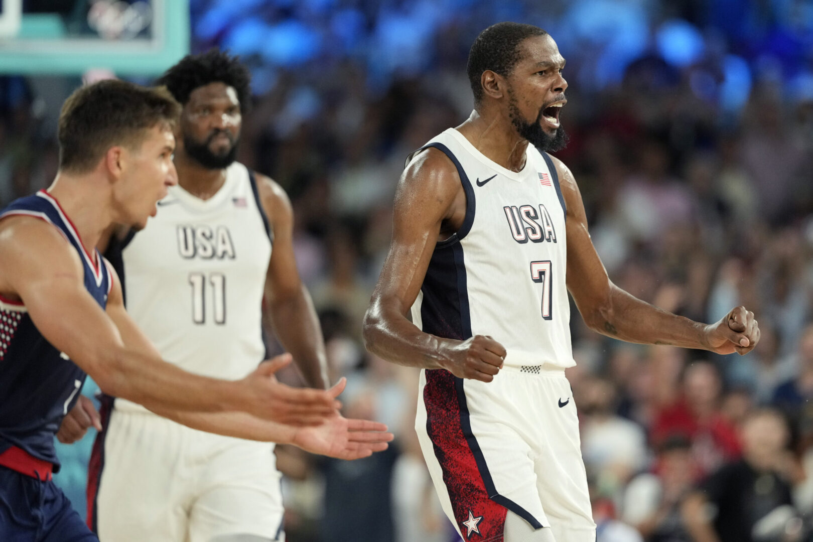 Aug 8, 2024; Paris, France; United States guard Kevin Durant (7) celebrates during the second half against Serbia in a men's basketball semifinal game during the Paris 2024 Olympic Summer Games at Accor Arena. Mandatory Credit: Kyle Terada-Imagn Images
