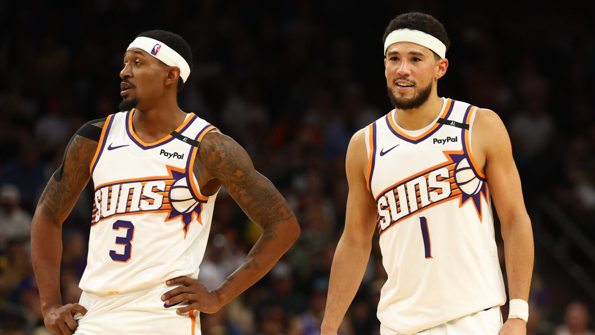 Oct 28, 2024; Phoenix, Arizona, USA; Phoenix Suns guard Bradley Beal (3) and Devin Booker (1) against the Los Angeles Lakers at Footprint Center. Mandatory Credit: Mark J. Rebilas-Imagn Images