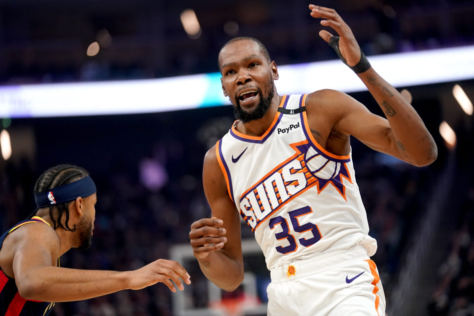 Jan 31, 2025; San Francisco, California, USA; Phoenix Suns forward Kevin Durant (35) reacts after having his jersey pulled during action against the Golden State Warriors in the first quarter at the Chase Center. Mandatory Credit: Cary Edmondson-Imagn Images