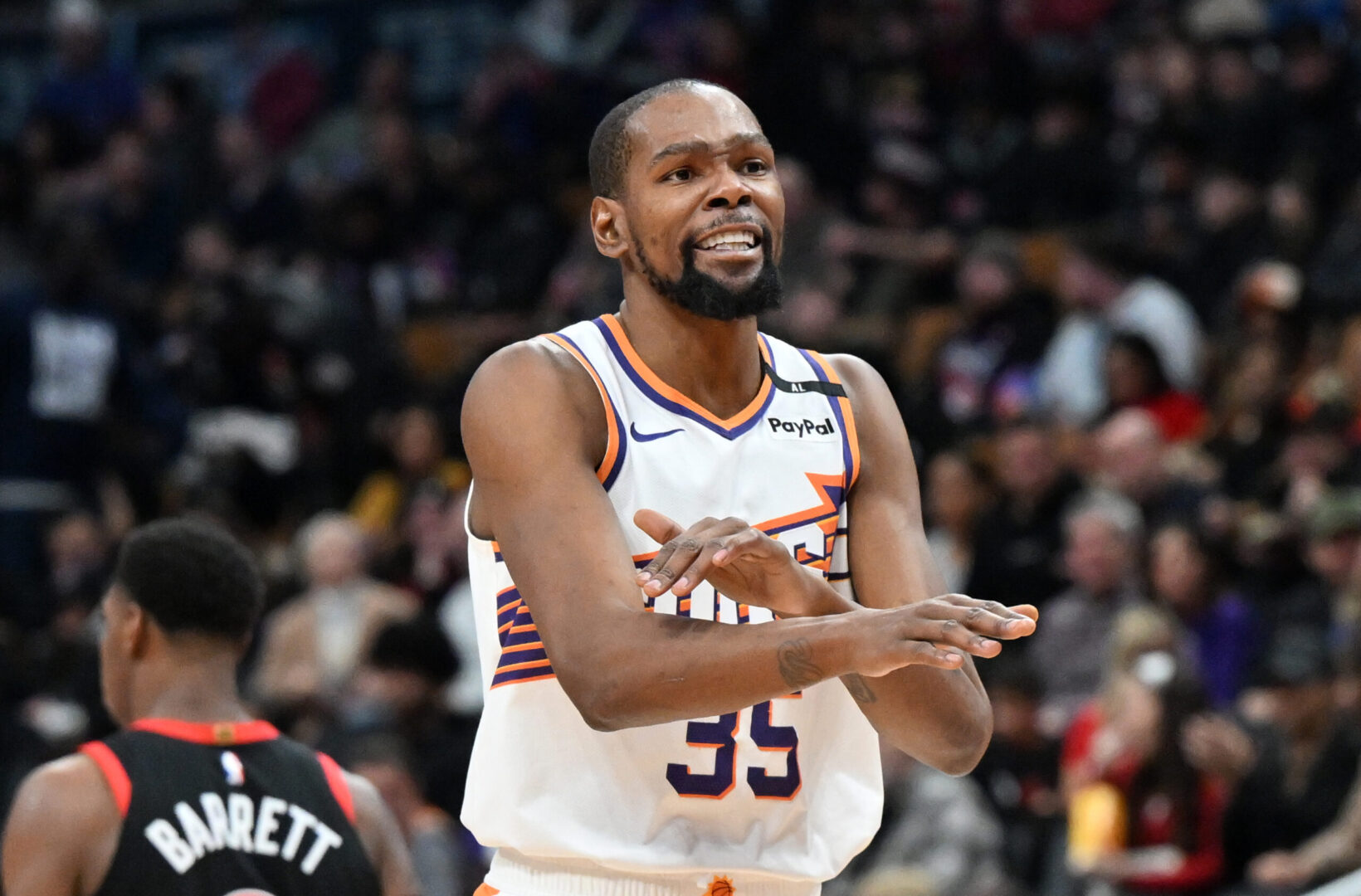 Feb 23, 2025; Toronto, Ontario, CAN; Phoenix Suns forward Kevin Durant (35) gestures to the referee for a foul call against the Toronto Raptors in the second half at Scotiabank Arena. Mandatory Credit: Dan Hamilton-Imagn Images