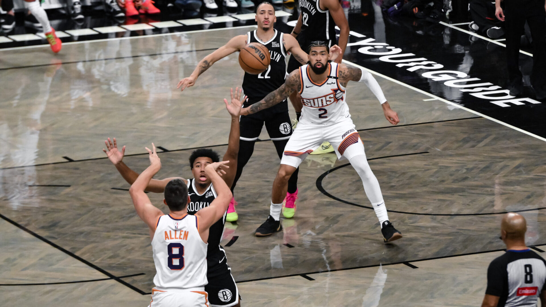 Jan 22, 2025; Brooklyn, New York, USA; Phoenix Suns center Nick Richards (2) awaits a pass from guard Grayson Allen (8) as Brooklyn Nets forward Jalen Wilson (22) defends during the second half at Barclays Center. Mandatory Credit: John Jones-Imagn Images