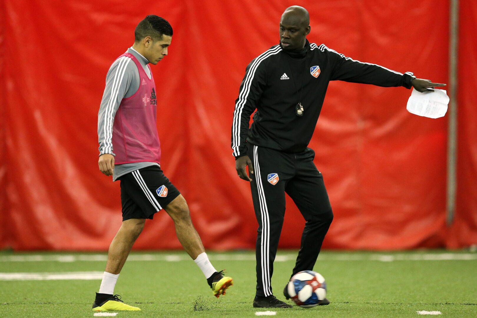 Assistant coach Pa-Modou Kah instructs a player during FC Cincinnati practice, Tuesday, Jan. 22, 2019, at the Sheakley Athletics Center in Cincinnati. Rising