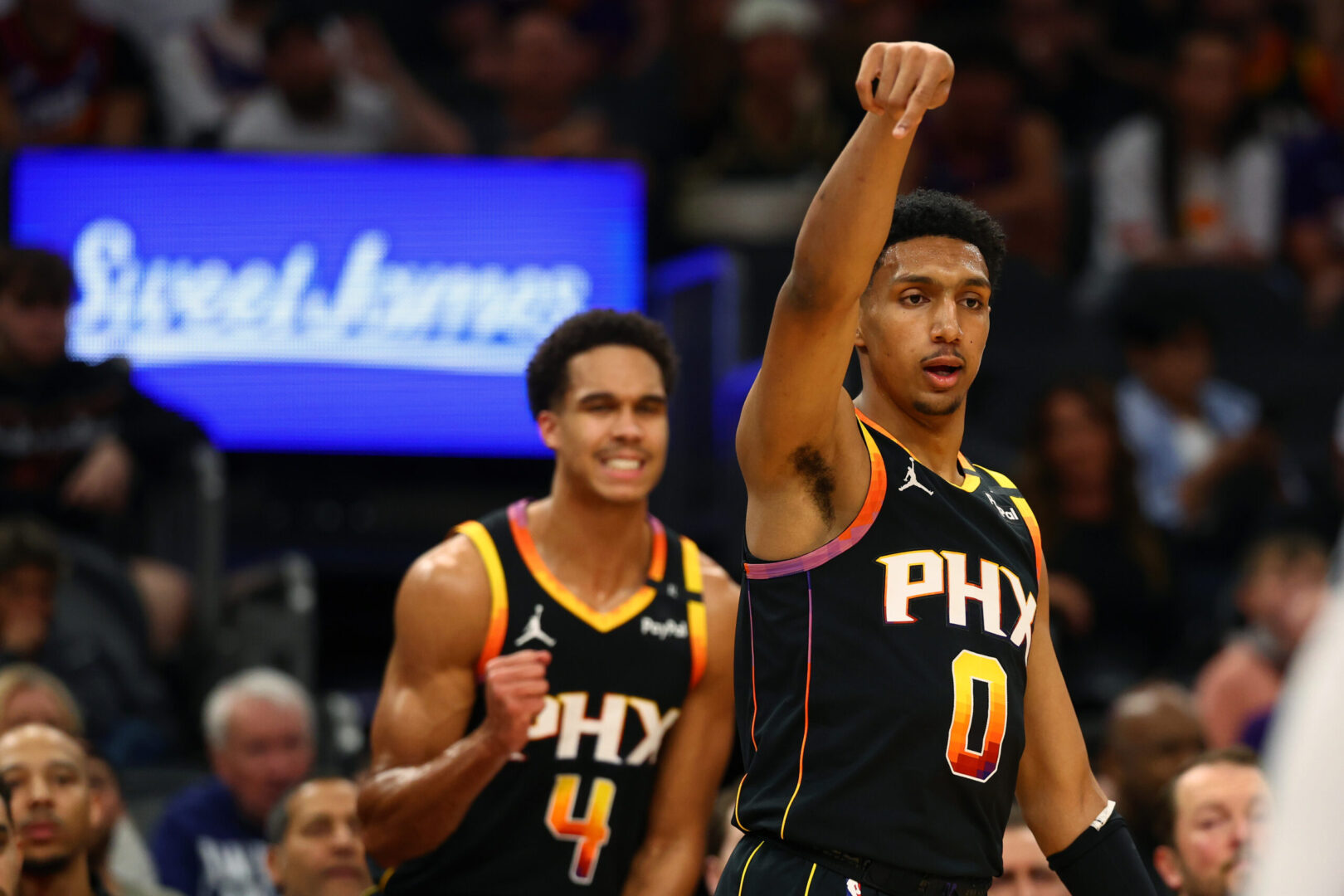 Apr 9, 2025; Phoenix, Arizona, USA; Phoenix Suns forward Ryan Dunn (0) reacts after a play against the Oklahoma City Thunder during the first half at Footprint Center. Mandatory Credit: Mark J. Rebilas-Imagn Images