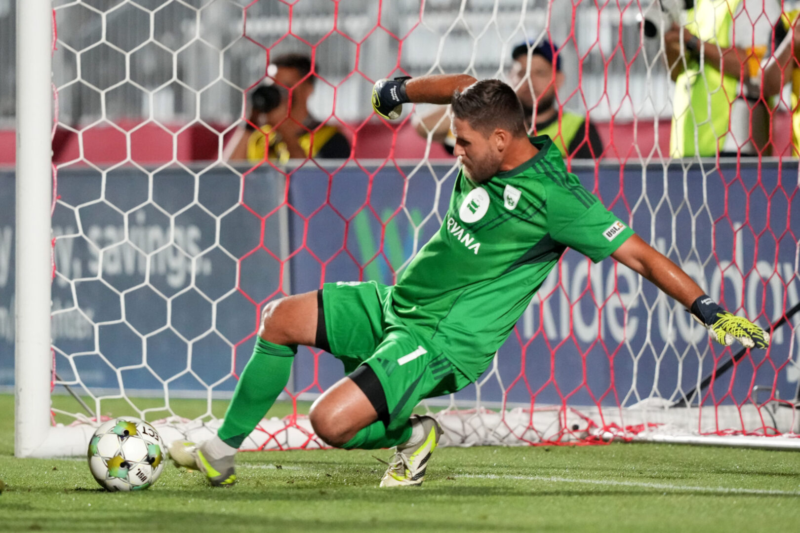Phoenix Rising goalkeeper Patrick Rakovsky makes a save against the Houston Dynamo during the second half on May 7, 2025. Credit: Joe Camporeale-Imagn Images