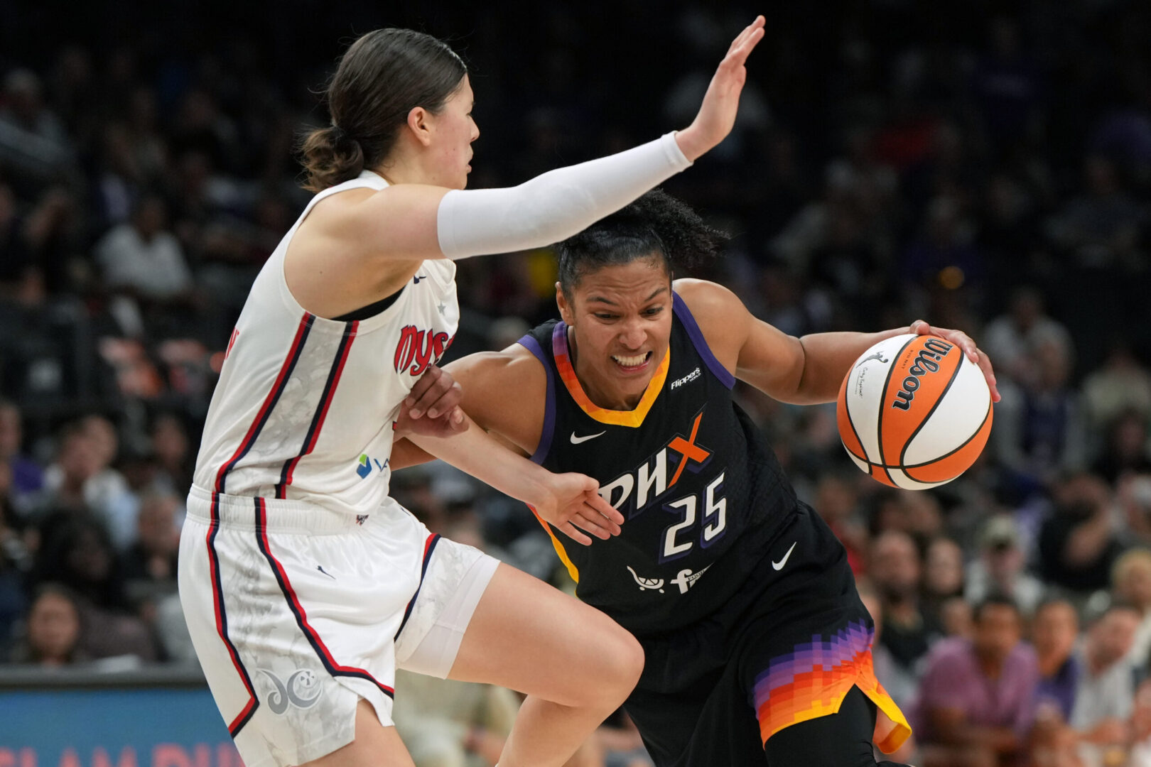 Phoenix Mercury forward Alyssa Thomas drives on Washington Mystics guard Jade Melbourne on May 25, 2025. Credit: Rick Scuteri-Imagn Images