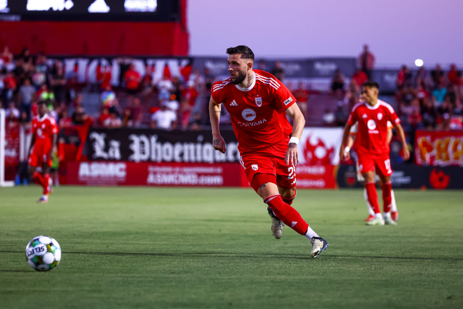 Phoenix Rising's Dariusz Formella dribbles across the field against the Orange County SC on June 8, 2025. Credits: Phoenix Rising FC