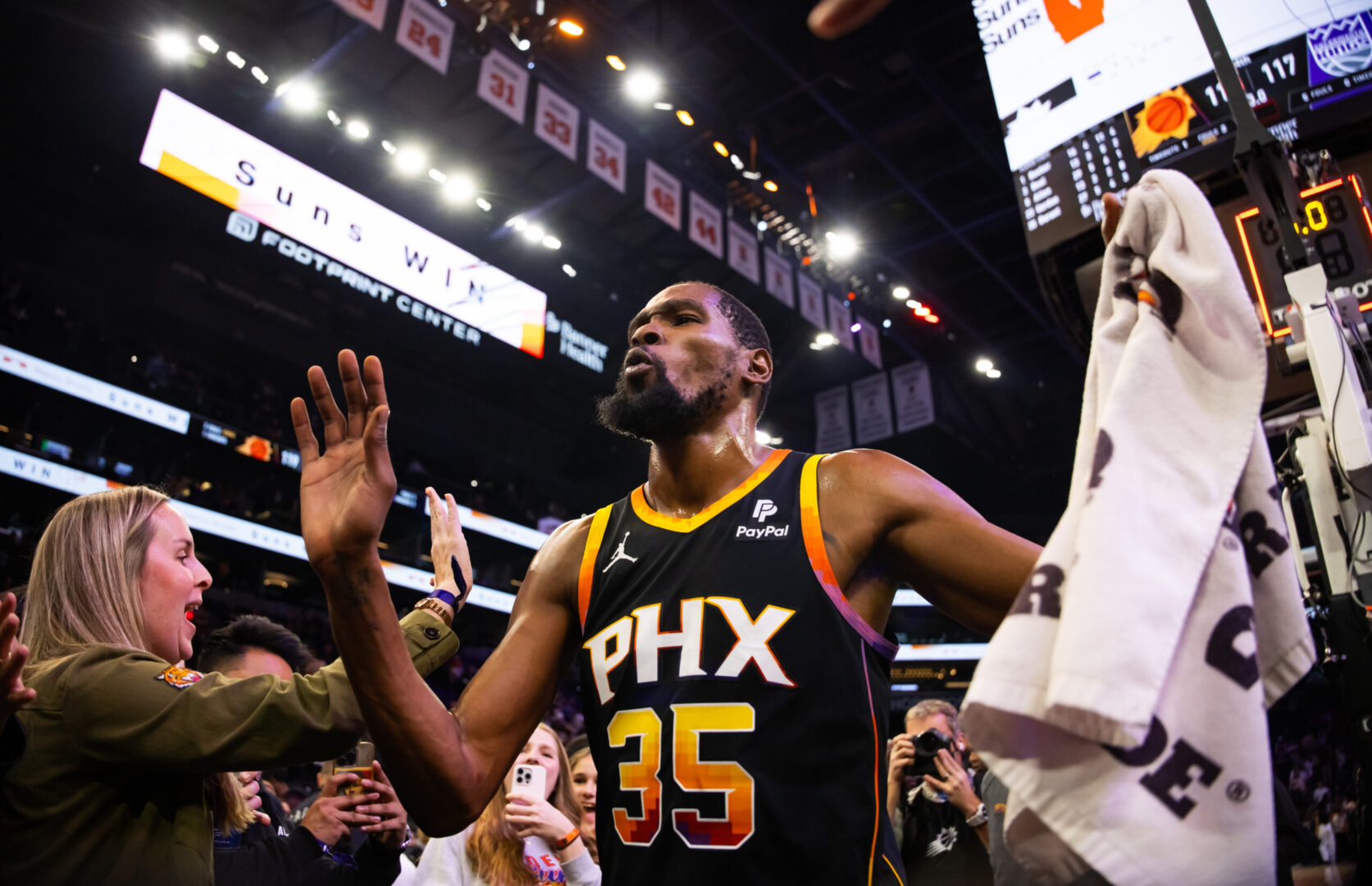 Jan 16, 2024; Phoenix, Arizona, USA; Phoenix Suns forward Kevin Durant (35) celebrates with the fans after beating the Sacramento Kings 119-117 at Footprint Center. Mandatory Credit: Mark J. Rebilas-USA TODAY Sports