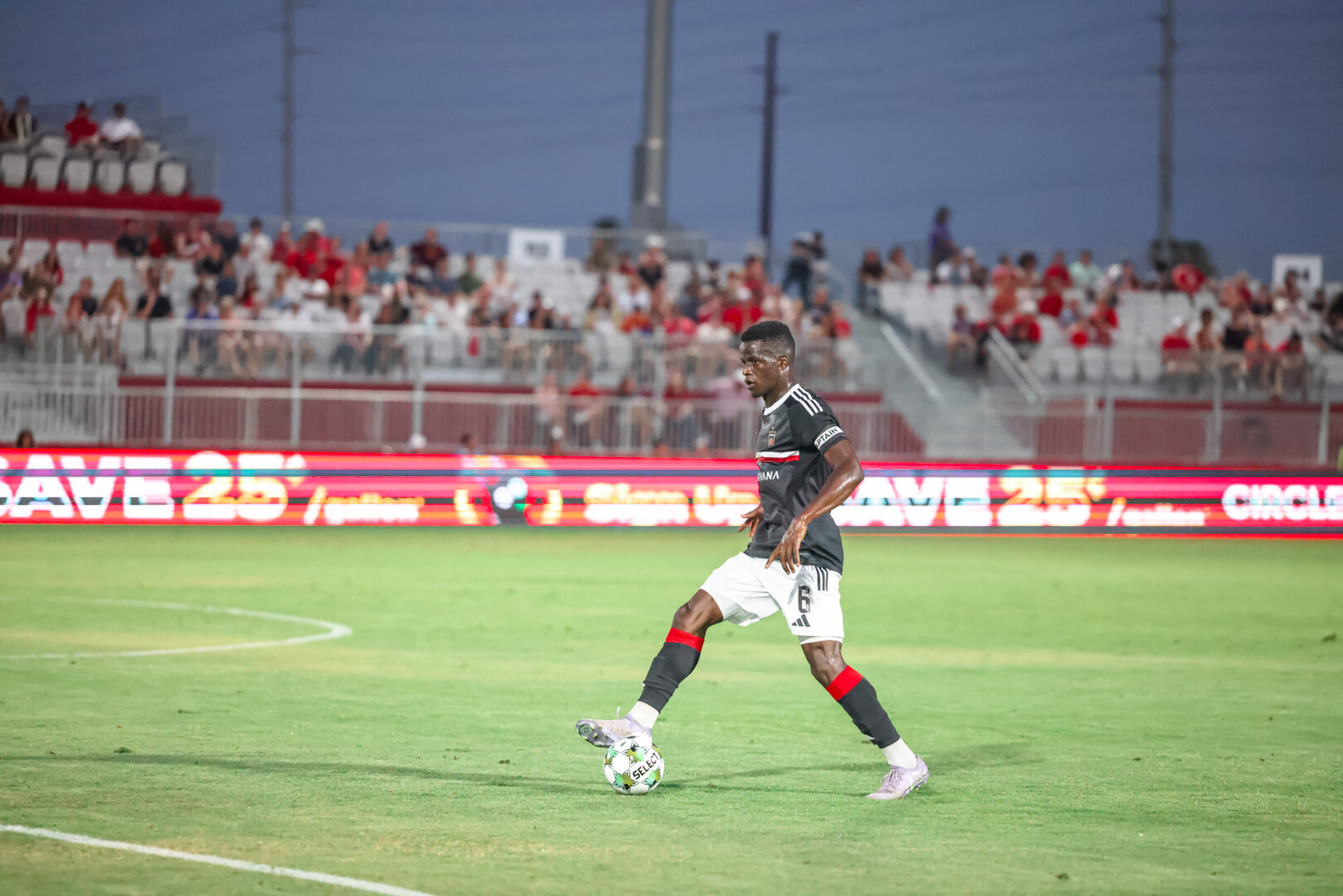 Phoenix Rising's Carl Sainte dribbles the ball looking to pass against Lexington SC on July 4, 2025. Credits: Phoenix Rising FC