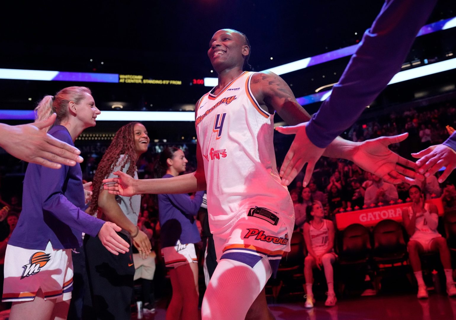 Phoenix Mercury forward Natasha Mack (4) is introduced before playing against the Golden State Valkyries in pre-season action at PHX Arena May 11, 2025.
