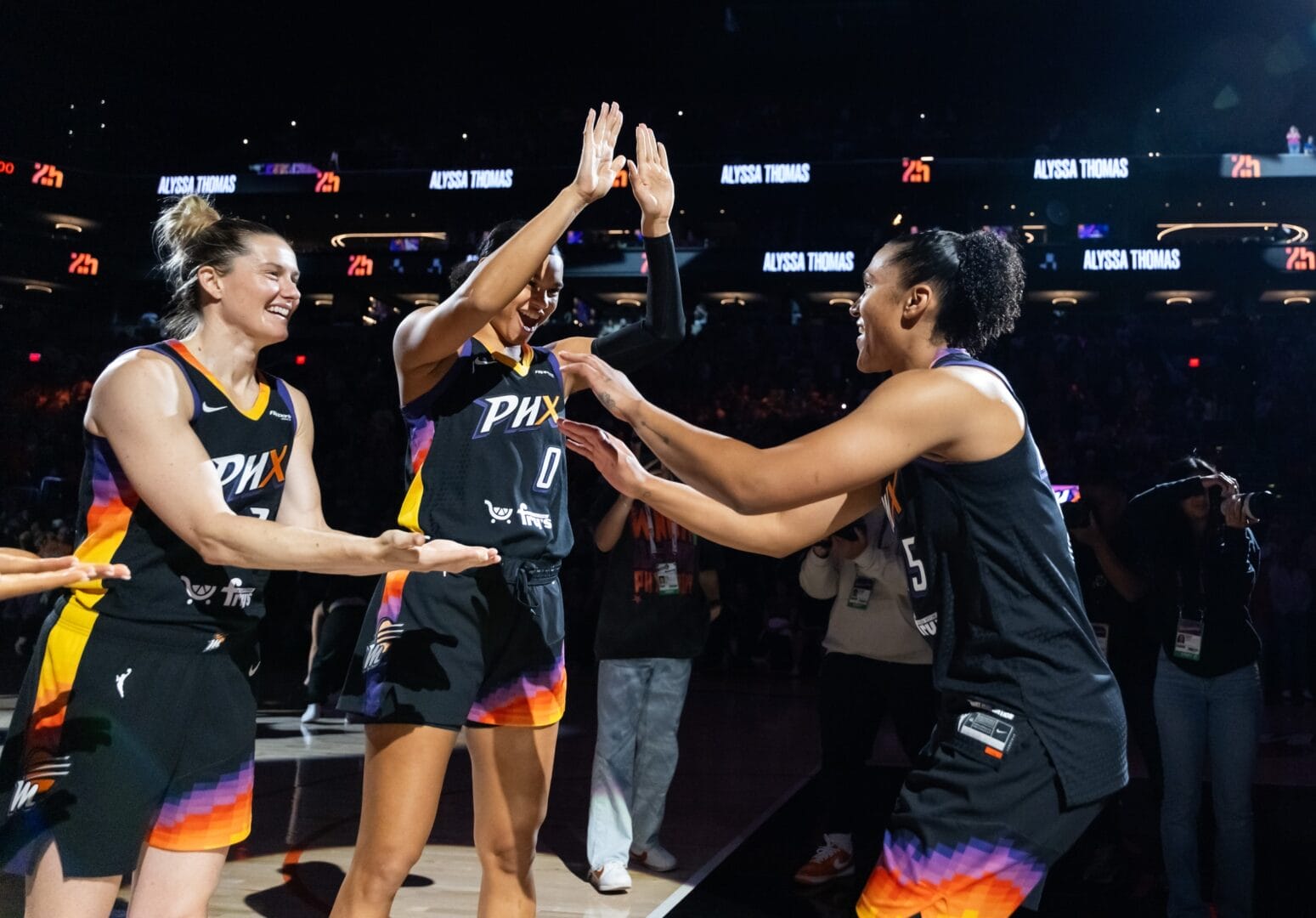Jun 11, 2025; Phoenix, Arizona, USA; Phoenix Mercury forward Alyssa Thomas (25) with forward Satou Sabally (0) and guard Sami Whitcomb (33) against the Dallas Wings at PHX Arena. Mandatory Credit: Mark J. Rebilas-Imagn Images