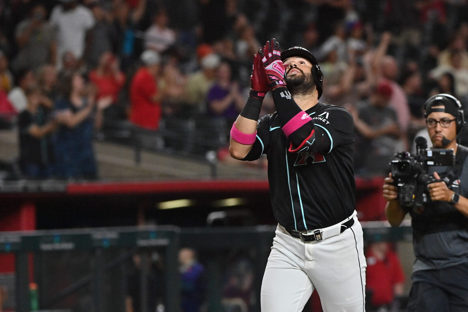 Jun 30, 2025; Phoenix, Arizona, USA; Arizona Diamondbacks third base Eugenio Suárez (28) hits a solo home run in the eighth inning against the San Francisco Giants at Chase Field. Mandatory Credit: Matt Kartozian-Imagn Images