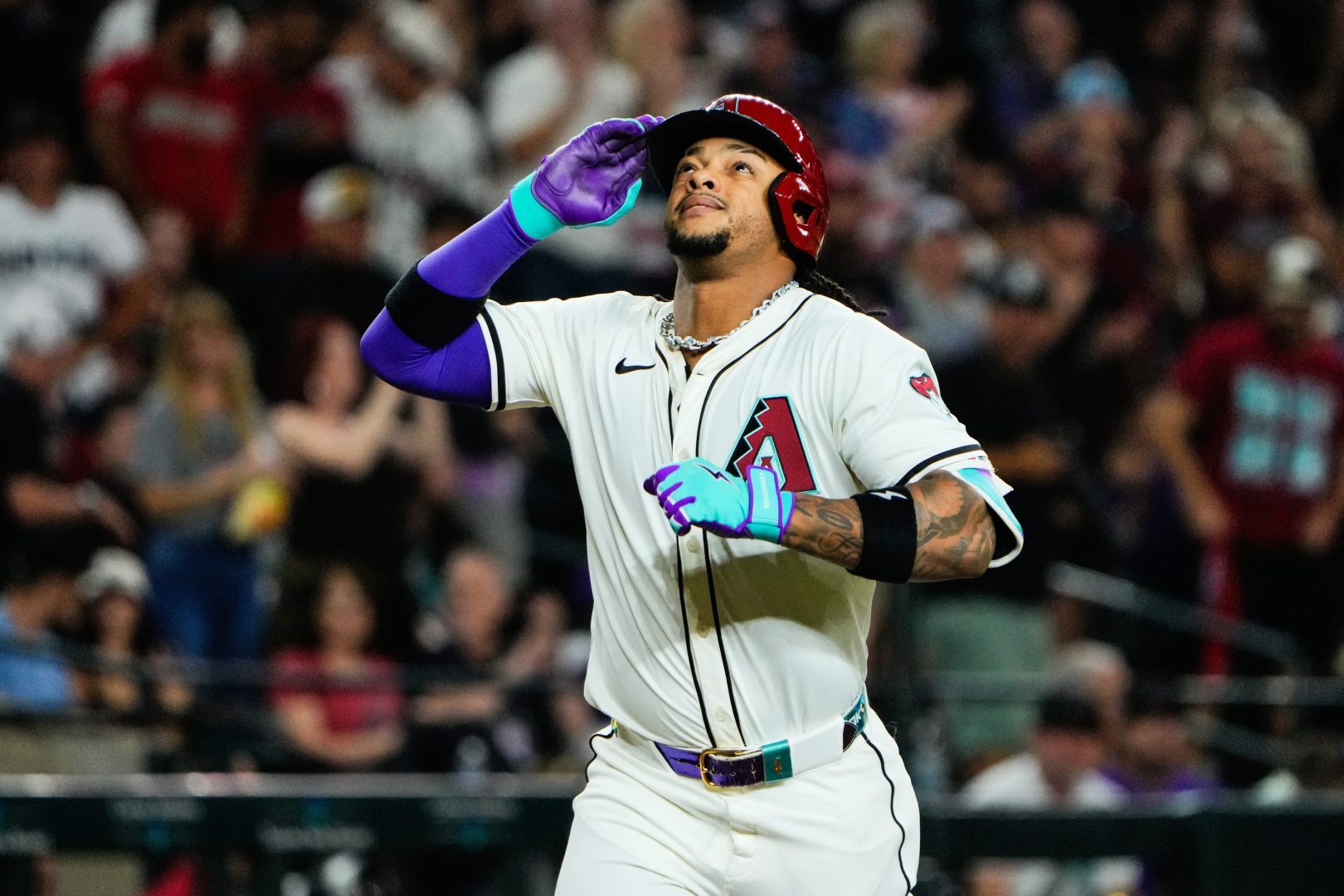 Jul 3, 2025; Phoenix, Arizona, USA; Arizona Diamondbacks second base Ketel Marte (4) celebrates during the ninth inning during a game between the Arizona Diamondbacks and the San Francisco Giants at Chase Field. Mandatory Credit: Arianna Grainey-Imagn Images