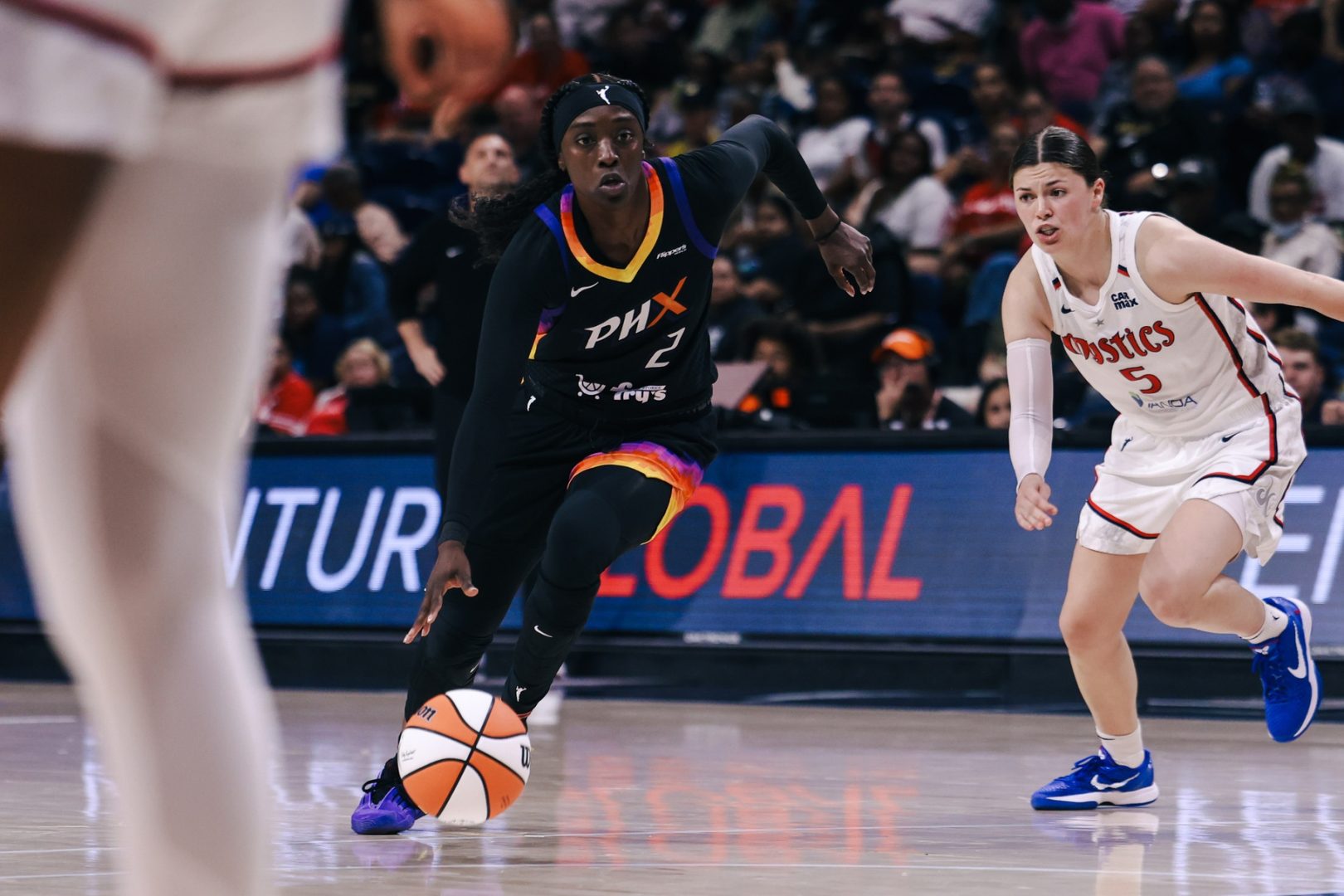 Jul 27, 2025; Washington, District of Columbia, USA; Phoenix Mercury guard Kahleah Copper (2) dribbles the ball while Washington Mystics guard Jade Melbourne (5) defends in the third quarter at CareFirst Arena. Mandatory Credit: Emily Faith Morgan-Imagn Images