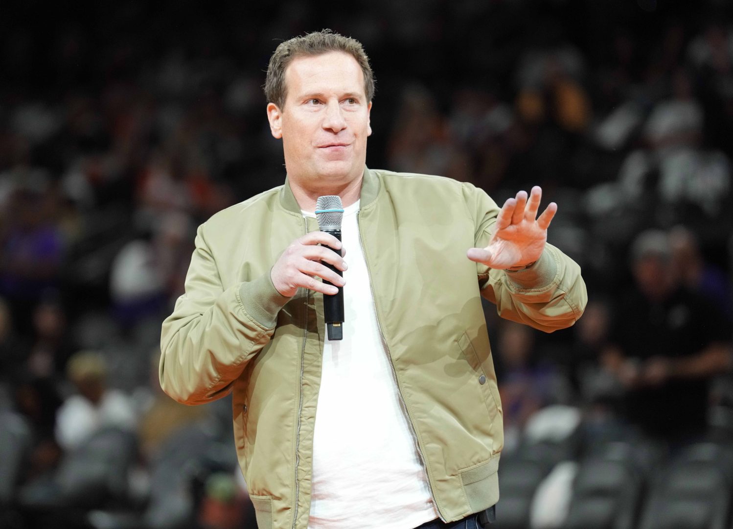 Oct 28, 2023; Phoenix, Arizona, USA; Phoenix Suns owner Matt Ishbia greets fans during a Ring of Honor half time ceremony of the game against the Utah Jazz at Footprint Center. Mandatory Credit: Joe Camporeale-Imagn Images