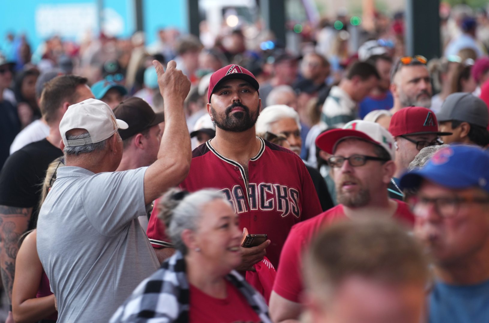 Fans gather outside Chase Field for the Arizona Diamondbacks Opening Day game against the Chicago Cubs in Phoenix on March 27, 2025. © Joe Rondone/The Republic / USA TODAY NETWORK via Imagn Images