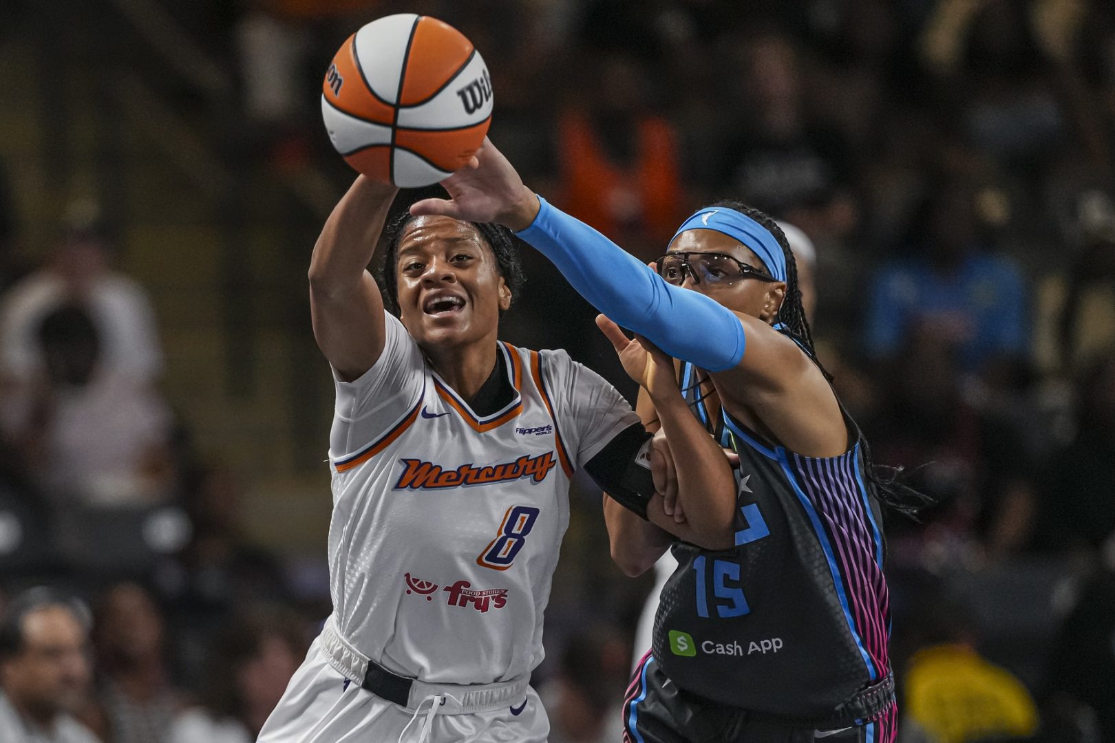 Aug 1, 2025; College Park, Georgia, USA; Phoenix Mercury guard Monique Akoa Makani (8) and Atlanta Dream guard Allisha Gray (15) battle for the ball during the first half at Gateway Center Arena at College Park. Mandatory Credit: Dale Zanine-Imagn Images