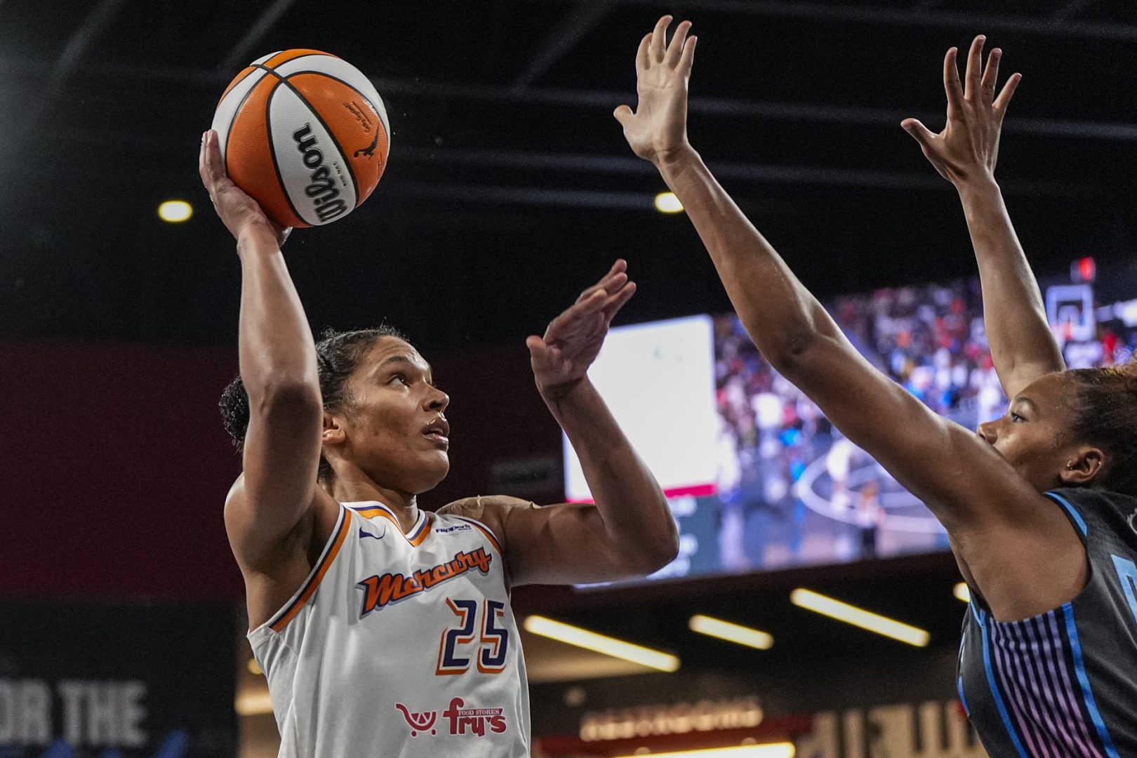 Aug 1, 2025; College Park, Georgia, USA; Phoenix Mercury forward Alyssa Thomas (25) shoots over Atlanta Dream forward Naz Hillmon (00) during the second half at Gateway Center Arena at College Park. Mandatory Credit: Dale Zanine-Imagn Images
