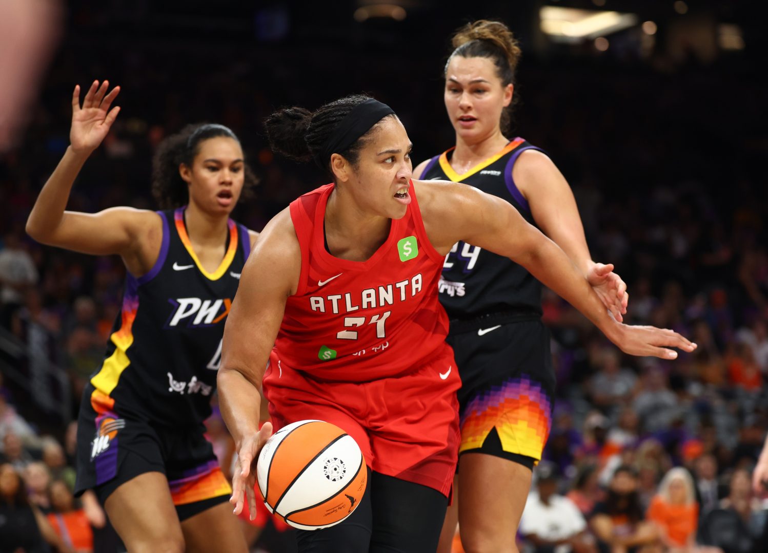 Aug 10, 2025; Phoenix, Arizona, USA; Atlanta Dream forward Brionna Jones (24) against the Phoenix Mercury in the first half at PHX Arena. Mandatory Credit: Mark J. Rebilas-Imagn Images